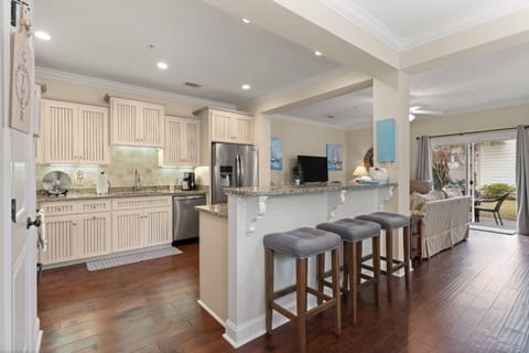 Sit at the bar and watch someone else cook for a change!