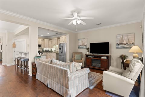 Stream your favorite shows from the living room smart TV and watch from the couch or the kitchen.