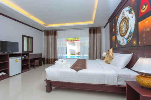 Deluxe Room, Pool View | Blackout drapes, rollaway beds, free WiFi