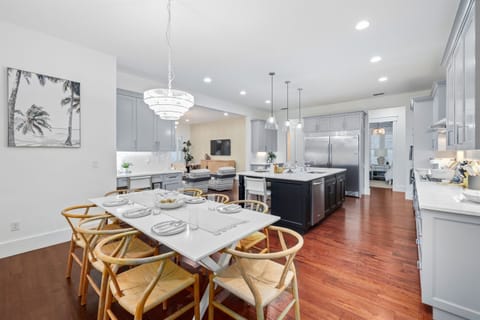 Coastal modern dining table with seating for the whole group
