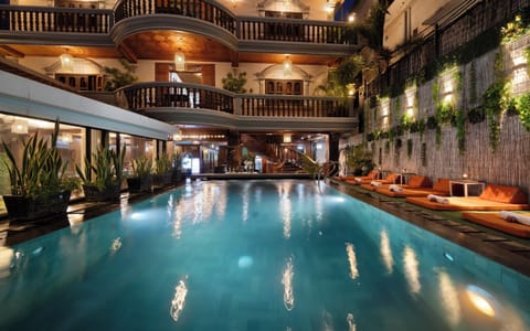 Outdoor pool, open 9:00 AM to 9:00 PM, free cabanas, pool umbrellas