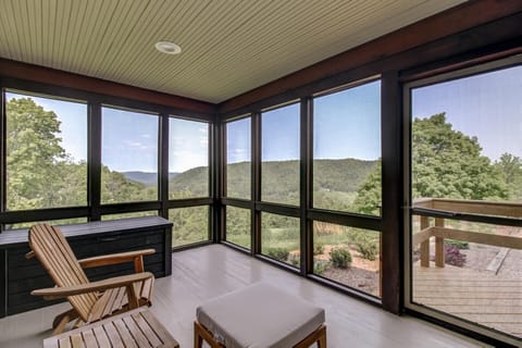 Private screened porch off the primary bedroom