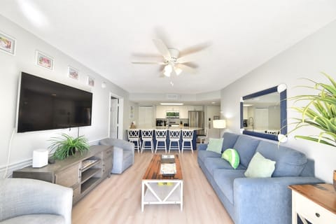 Relax in the spacious living room, complete with a ceiling fan and large TV for ultimate comfort, or whip up a meal in the fully renovated kitchen with all-new appliances