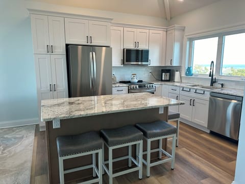 Fully equipped kitchen with stunning Bay views!