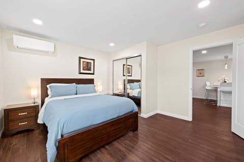 Main bedroom! Charging lamps on both side of the bed, spacious closet, ironing!