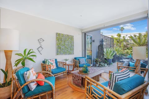 Sitting Area with Bifold doors that open up to the back patio