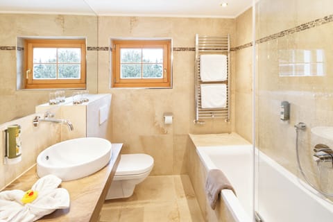 Hair dryer, bathrobes, slippers, towels