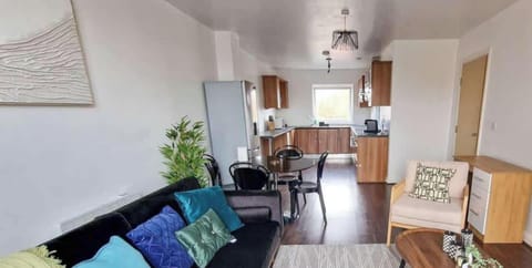 Step into your spacious open plan living area, perfect for unwinding after exploring Manchester