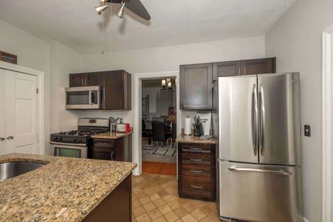 The stylish kitchen offers ample space & all the comforts of home