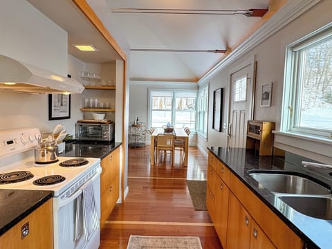 Clean and organized kitchen for making a nice meal for your friends and family. 