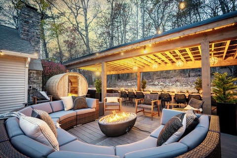 Spacious oversized deck with covered seating for up to 22 guests.