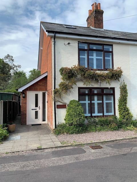 Deceptively spacious cottage, on a residential road with parking in front. 