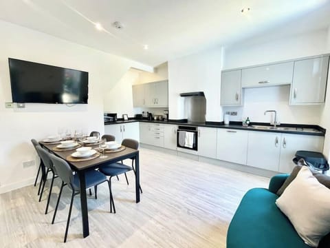 Kitchen/Dining Area with Smart TV (1)