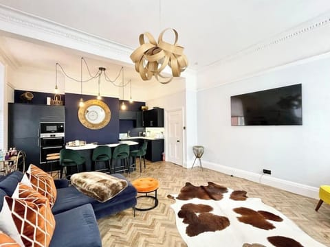 Open Plan Kitchen/Living Area with Smart TV