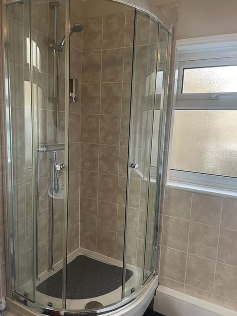 Shower, free toiletries, towels, toilet paper