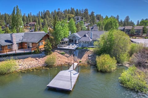 This breathtaking getaway allows you to bring your boat, launch a kayak, paddleboard, fish off the back dock, or relax at the outdoor bar and fire pit.