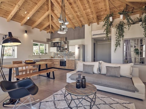 The fully equipped kitchen and cozy living room, perfect for family gatherings.