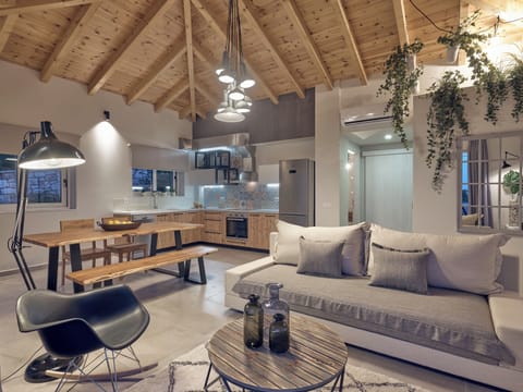 The living area offers a cozy retreat with a 42’ Smart TV.