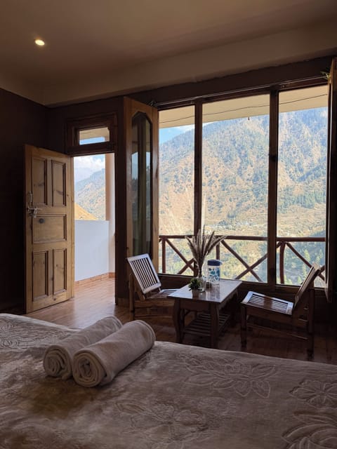 Deluxe Double Room, Patio, Mountain View | Desk, laptop workspace, free WiFi, bed sheets