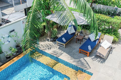 Outdoor pool, open 7 AM to 8 PM, pool umbrellas, sun loungers