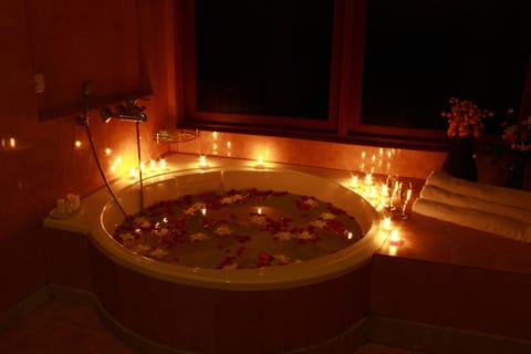 Superior Suite, 1 King Bed, Hill View | Bathroom | Combined shower/tub, free toiletries, hair dryer (on request), slippers
