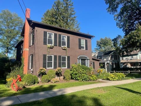 The house is a historic gem set on an idyllic tree lined street.