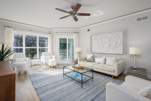 Coastal-inspired décor and clean lines blend seamlessly with the surrounding living space, creating a polished yet relaxed extension of the home.