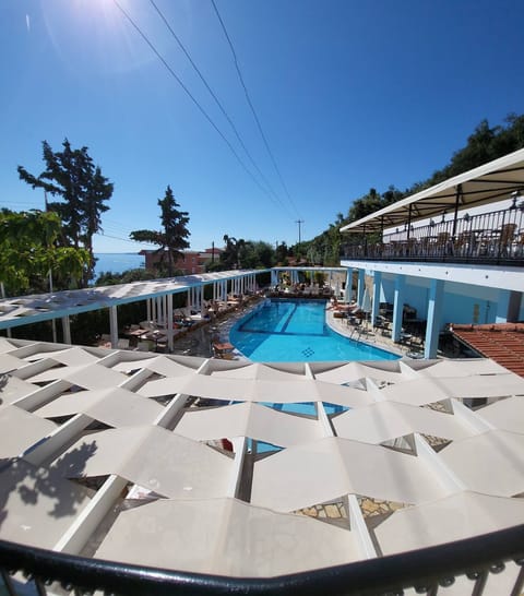 Seasonal outdoor pool, pool umbrellas, sun loungers