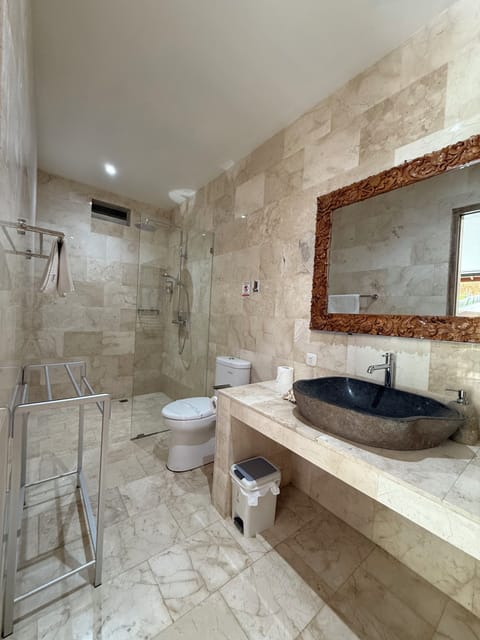 Premium Suite, 1 Bedroom | Bathroom | Shower, rainfall showerhead, free toiletries, hair dryer