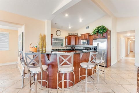 Ample seating at this luxurious kitchen bar