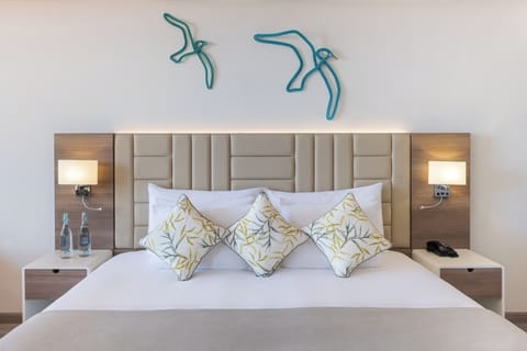 Premium bedding, down comforters, memory foam beds, minibar