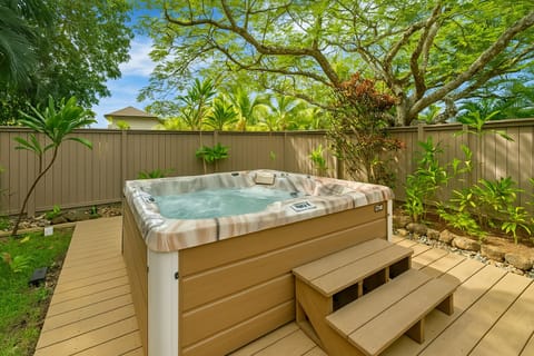 Private back patio with rain shower and hot tub