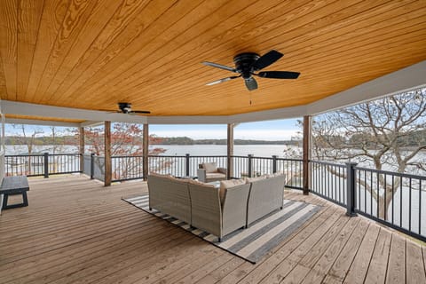 Welcome to Azalea Point! Enjoy the upper level deck with sectional and ceiling fan.