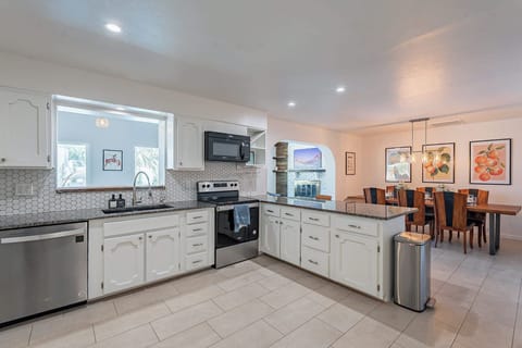 Experience the spaciousness of our open floor concept, where living, dining, and kitchen areas flow seamlessly together.