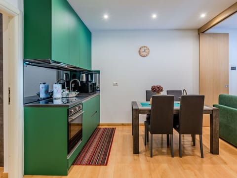 Interior Design, Flooring, Floor, Furniture, Wood, Ceiling, Room, Kitchen, Cabinetry, Lighting