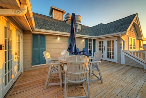 Outdoor space with a dining area and seating.