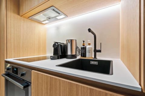 Well-Designed Cooking Space – Compact yet practical, the kitchen area provides everything you need to prepare meals.