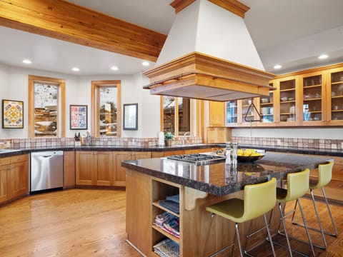 Chef's kitchen has professional-grade appliances (Wolf stove and griddle)