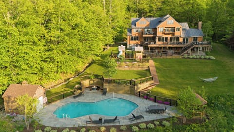 Splash into summer! Enjoy our sprawling, private backyard featuring a gorgeous heated pool (open Memorial Day to Labor Day).