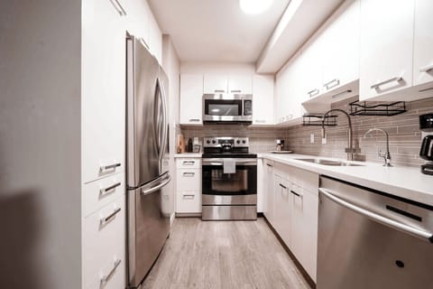 Comfort Condo | Private kitchen | Coffee/tea maker, electric kettle, toaster