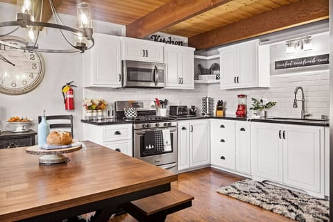 Open concept kitchen featuring a dining space.