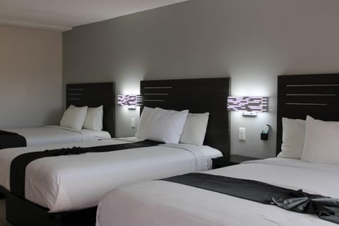 Standard Room, Multiple Beds, Non Smoking | Desk, laptop workspace, free WiFi, bed sheets