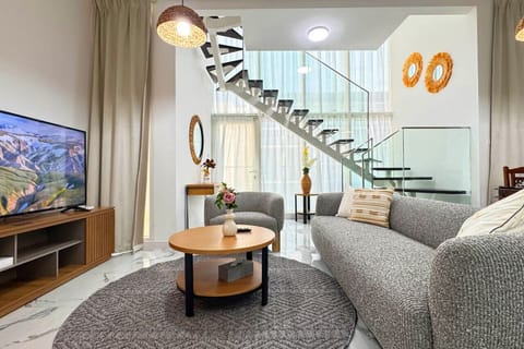 Indulge in Elegance: Relax in a Living Room Designed for Comfort & Style