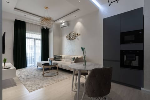 Family Condo, Balcony, City View | Living area
