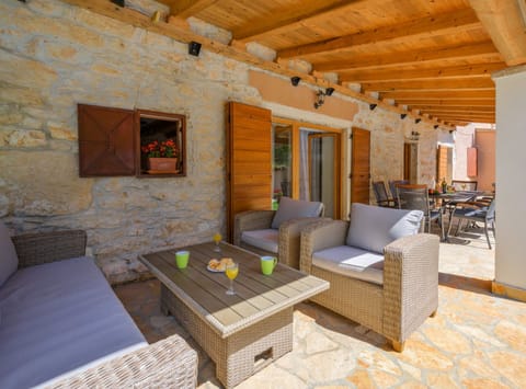 Villa (Four Bedroom Villa with Private Pool) | Living room | 32-inch flat-screen TV with satellite channels