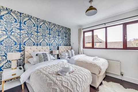 Bedroom 1 has zip link beds configured as two single beds by default or can be zipped together as a king size bed upon request.