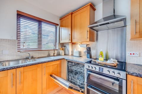 The kitchen is fully equipped with everything you need to prepare a home-cooked mea