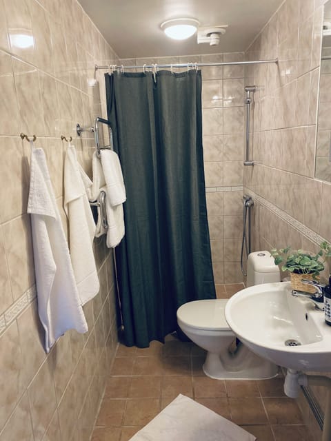 Garden Room, Breakfast Included | Bathroom | Shower, hair dryer, towels, soap