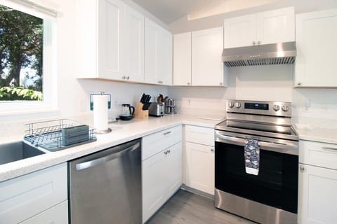 Full kitchen with knife set, spice rack, toaster, blender, and much more.