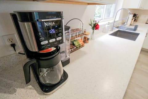 Coffee maker, coffee and tea, sugar and more.